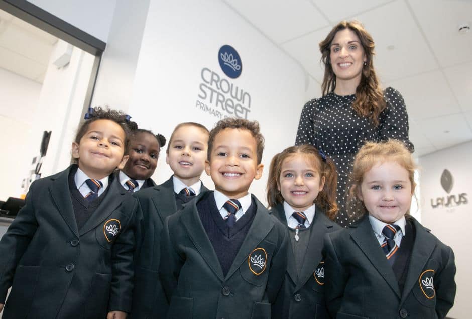 Mrs Thompson pictured with children at Crown Street Primary School.