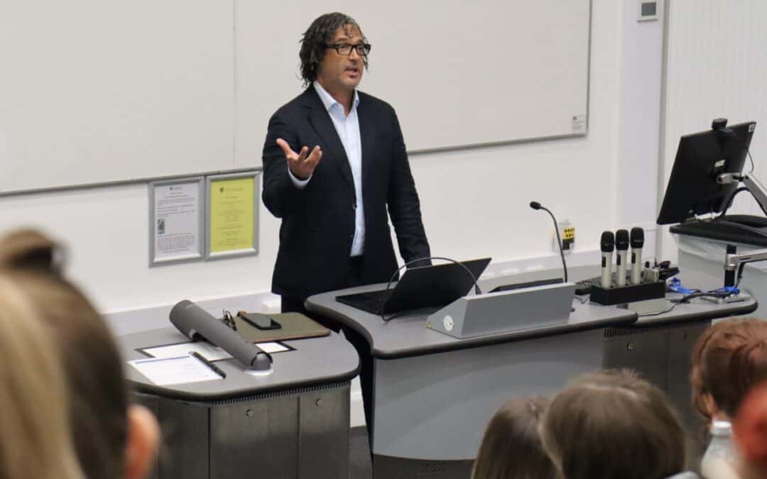 David Olusoga OBE delivers a talk to Laurus Trust Apertura students in a lecture theatre at the University of Liverpool.